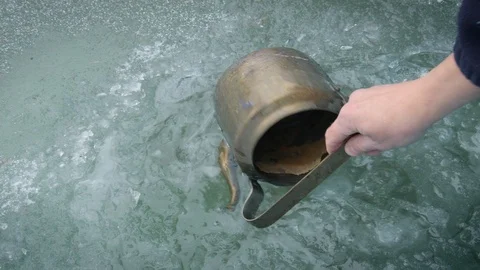 Kettle In Ice Hole Video stock 98600550