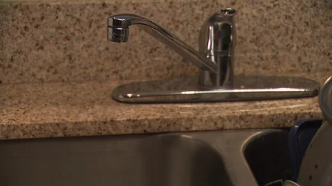 Kettle in Kitchen Stock Footage 123922590