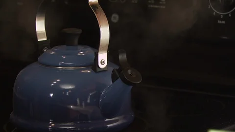Kettle in Kitchen Stock Footage 123922839