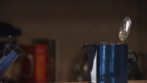 Kettle in Kitchen Stock Footage 123922911