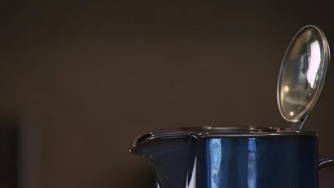 Kettle in Kitchen Stock Footage 123922934