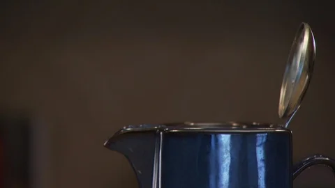 Kettle in Kitchen Stock Footage 123922946