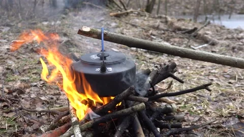 Kettle on an open fire Stock Footage 152373771