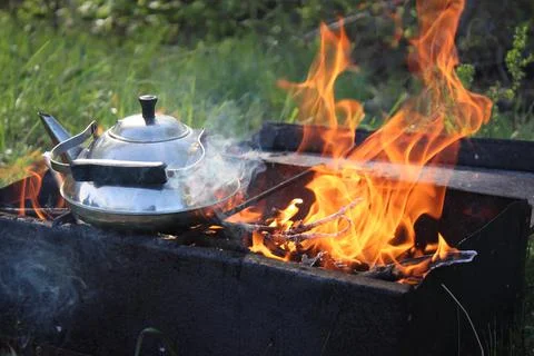 Kettle on an open fire Stock Photos