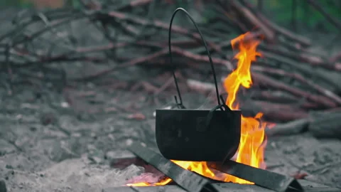 Kettle Over Campfire with Flames Stock Footage 285301045