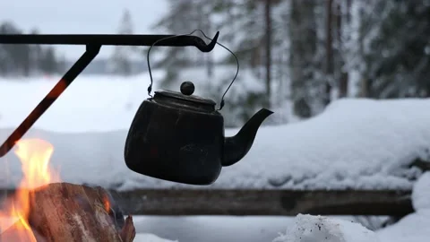 https://images.pond5.com/kettle-over-open-fire-winter-footage-147045485_iconl.jpeg