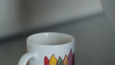 The kettle pours boiling water in a cup and it turns out coffee Stock Footage 91033080