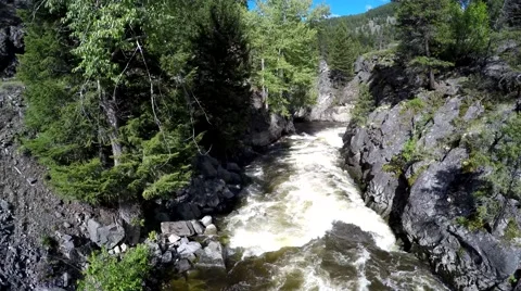 Kettle River, aerial hover over rapids. Spring Stock Footage 50652416