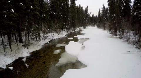 Kettle River, frozen, reverse flight Stock Footage 50655318