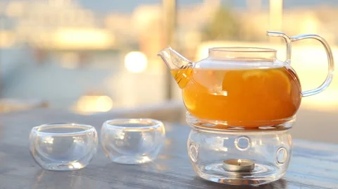 Kettle with sea-buckthorn tea on the table 库存影片 67511480