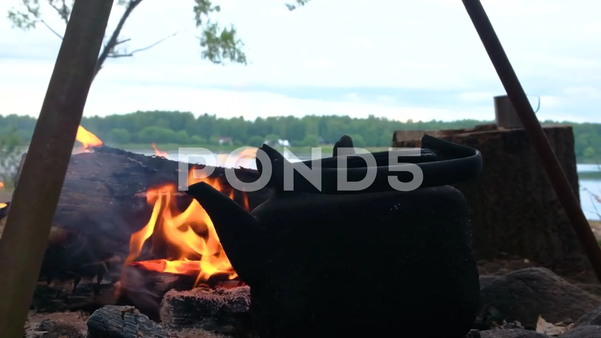 camping - kettle over campfire, Stock Video