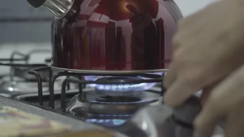 Kettle on the stove Stock Footage 144545772