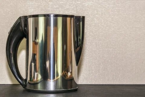 Kettle on the table. Stock Photos