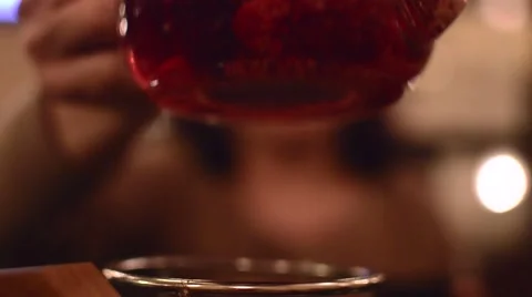 Kettle with tea and berries inside Stock Footage 58800127