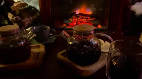 A kettle with tea near a fireplace with a hearth Stock Footage 295154392