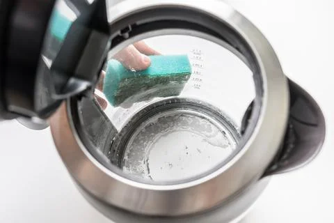 Kettle with white limescale surface - hard water concept Stock Photos