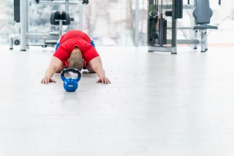 Kettlebell training in gym Stock Photos