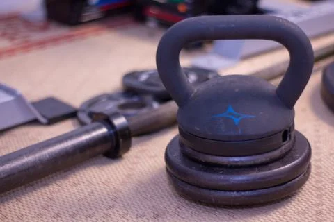 Kettlebell with weights in the background 写真素材