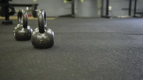 Kettlebells on Athletic Surface Stock Footage 54372942