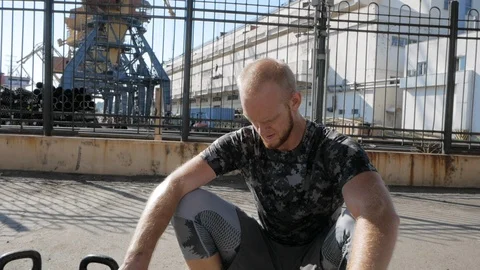 Kettlebells exercises outdoors Stock Footage 97532490