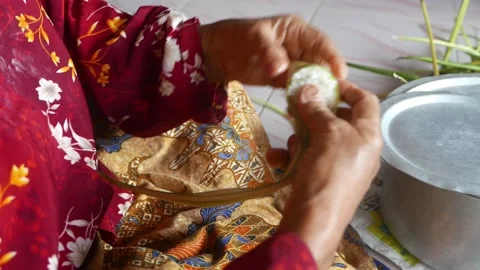 Ketupat or rice dumpling making process Stock Footage 135967049
