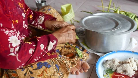 Ketupat or rice dumpling making process Stock Footage 135967367