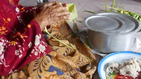 Ketupat or rice dumpling making process Stock Footage 135967547