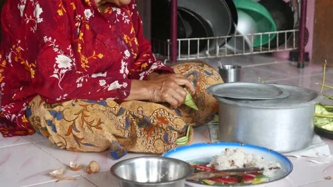Ketupat or rice dumpling making process Stock Footage 135967733