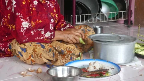 Ketupat or rice dumpling making process Stock Footage 135967813