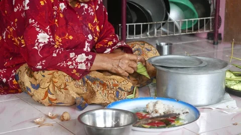 Ketupat or rice dumpling making process Stock Footage 135968190