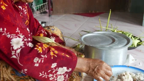 Ketupat or rice dumpling making process Stock Footage 135968338