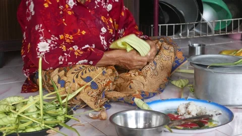 Ketupat or rice dumpling making process Stock Footage 135968378