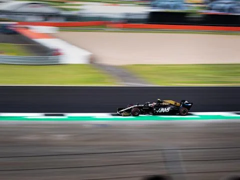 Kevin Magnussen flying through the last corner Club at Silverstone Stock Photos