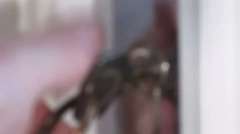 Key being turned and door being opened and closed defocused shot Видео 39990398