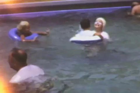 KEY BISCAYNE FLORIDA, 1950 - Little girls and boys play in swimming pool  Stock Footage 122320904