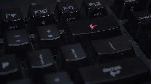 Key blinks Backspace on glowing computer keyboard Stock Footage 102833517