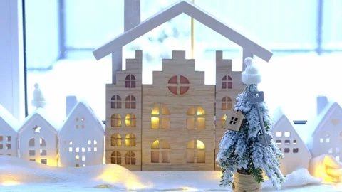 Key on Christmas tree and tiny house on cozy home with Christmas decor on t.. Stock Footage 262413420