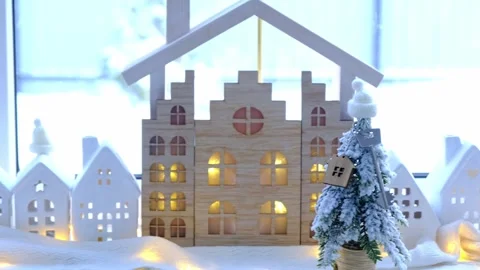 Key on Christmas tree and tiny house on cozy home with Christmas decor on t.. Stock Footage 262413428