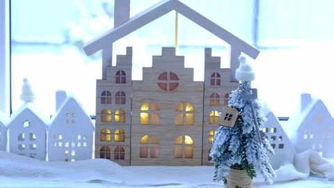 Key on Christmas tree and tiny house on cozy home with Christmas decor on t.. Stock Footage 262413735