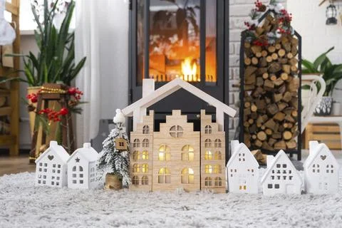 Key on Christmas tree and tiny house on cozy home with Christmas decor near the 写真素材