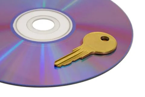 Key on computer cd Key on computer cd, isolated on white background Copyri... Foto stock