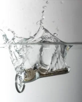 Key drops in water Stock Photos