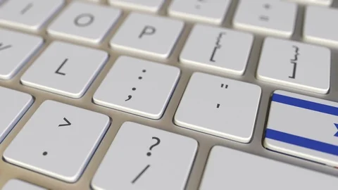 Key with flag of Israel on the computer keyboard switches to key with flag of Stock Footage 109212723