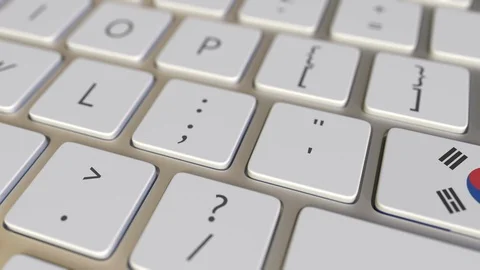 Key with flag of South Korea on the computer keyboard switches to key with flag Stock Footage 109282394