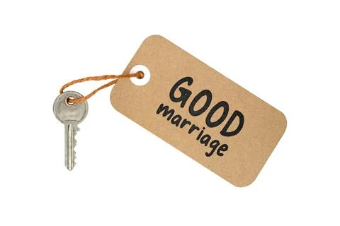 Key to Good Marriage Concept Message: Door Key with Cardboard Tag and Text Stock Photos