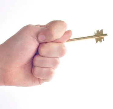 Key in hand with a gesture of the fig Stock Photos