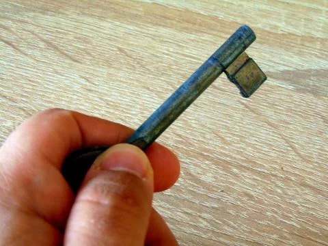 A key in a hand Stock Photos