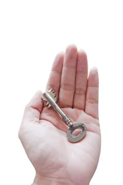 Key on hand on white background. Stock Photos