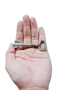Key on hand on white background. Stock Photos