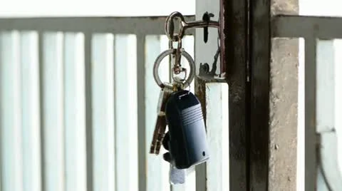 Key hanging on door Stock Footage 21284449